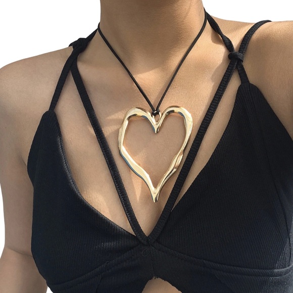Large gold-tone Freeform heart necklace on a black faux leather cord. - Picture 2 of 7